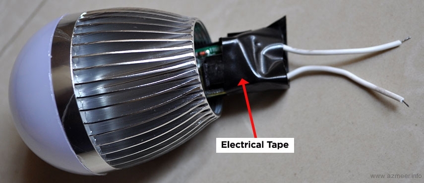 Driver circuit wrapped in electrical tape to prevent short circuit with the heat sink