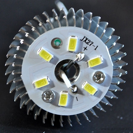 LED board fixed to heat sink, both wires soldered